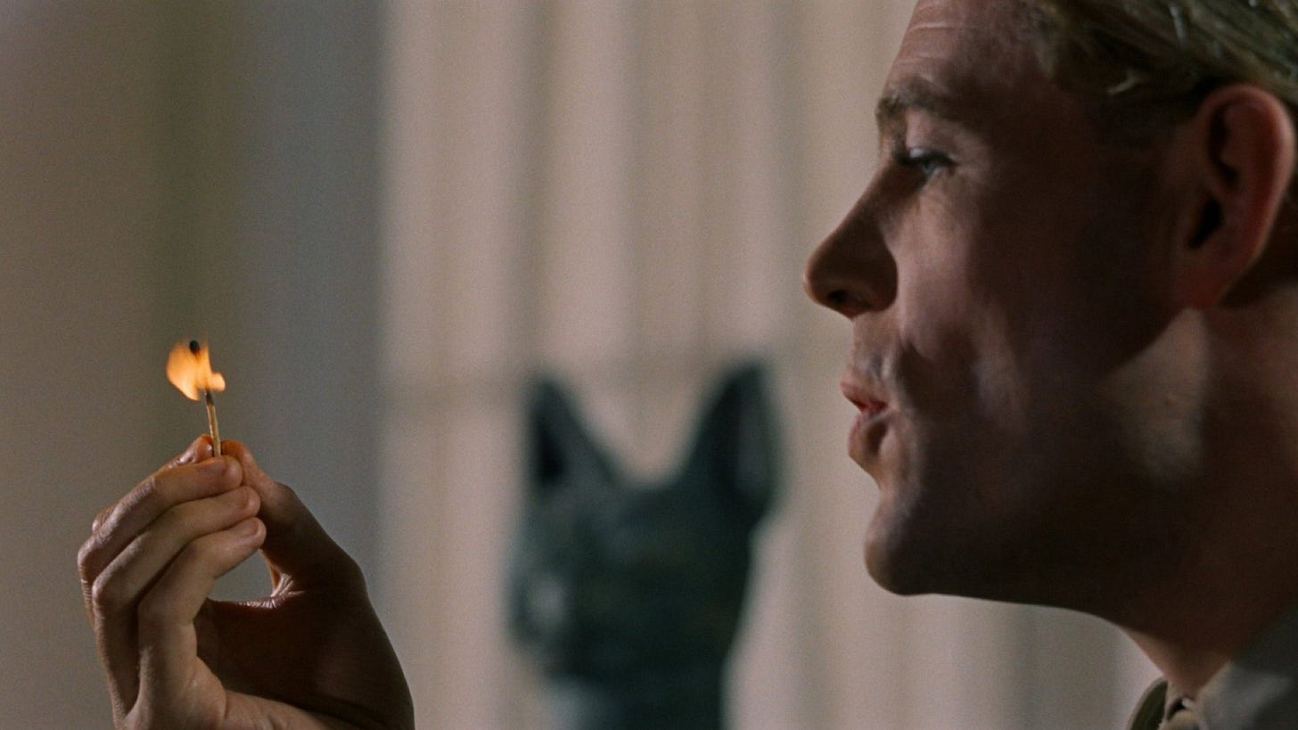 Lawrence of Arabia | Still features Peter O'Toole as T.E. Lawrence blowing a match.