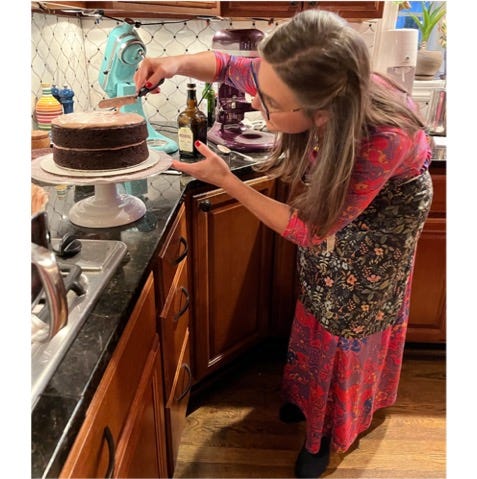 A child washing dishes in the kitchen

Description automatically generated with low confidence
