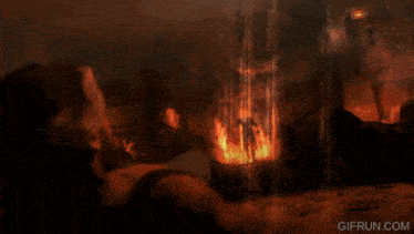 a gif from gifrun.com shows a man in a fire