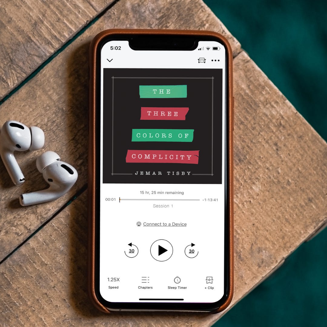 Picture of smartphone with "The Three Colors of Complicity" playing on the audio
