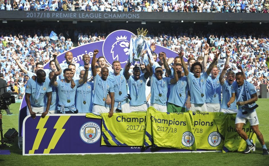 Manchester City crowned champions of Premier League 2017-18 season at  Etihad Stadium – Firstpost