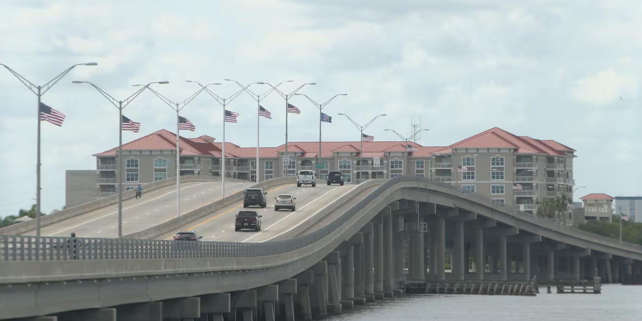 American Flags Line Green Bridge, Creating Tribute to Veterans and Community