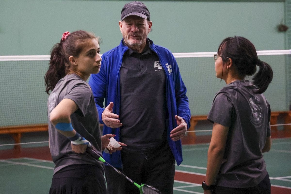 El Camino College badminton coach David Levin reconvenes with players Anya Gore and Montila Winyaworapon during a match Wednesday, April 23. Gore and Winyaworapon competed in doubles and won the consolation title at the 3C2A State Championships on Saturday, May 10. (Erica Lee | The Union)