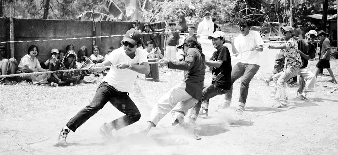 a group of men playing a game of baseball a group of men playing a game of baseball