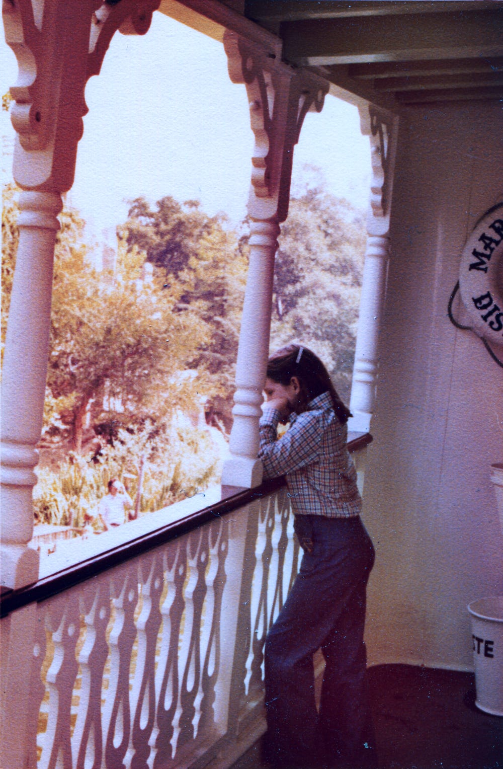 KimBoo looking moody as she looks over the railing on the steamboat