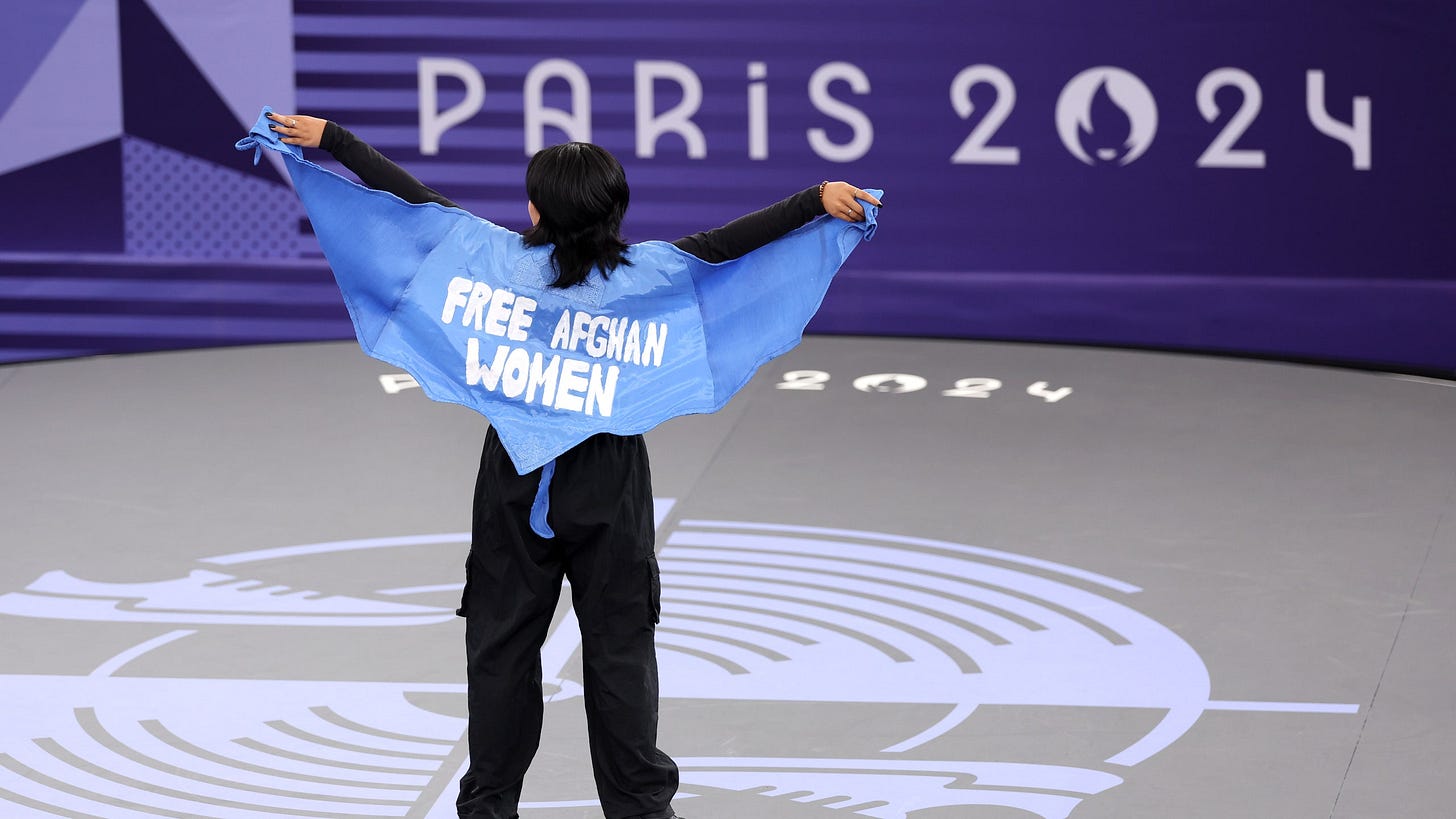 BGirl Manizha Talash wears a free afghan women cape during olympics breakdancing