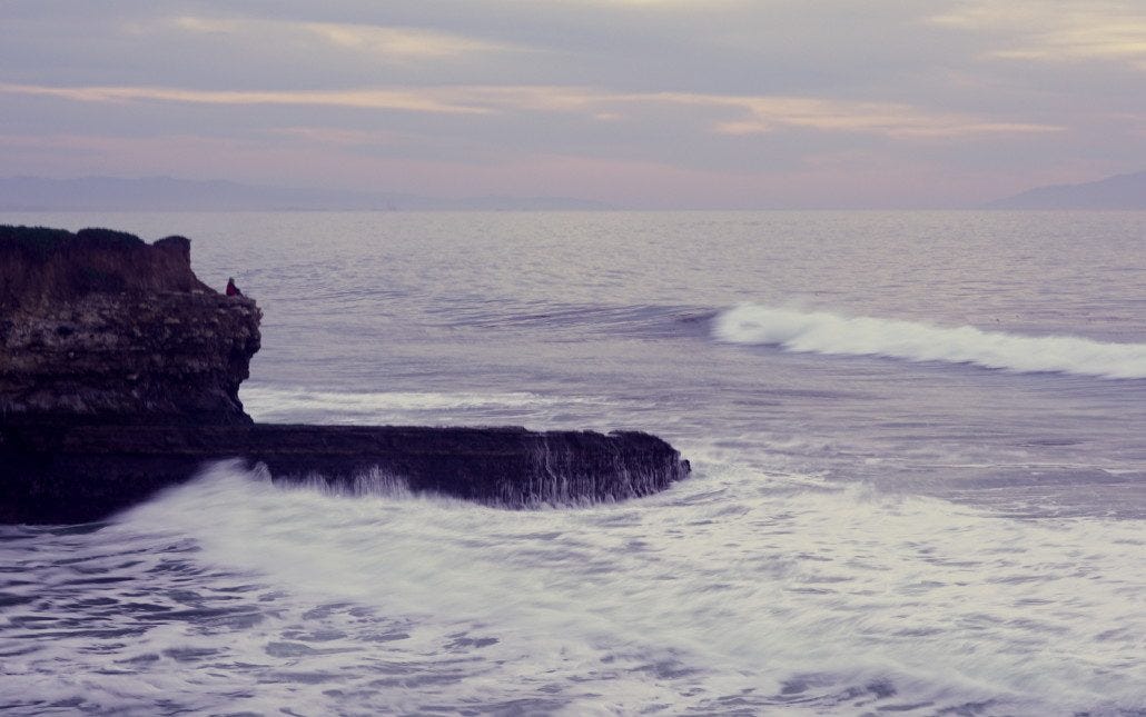 My friend Reese enjoys a quiet sunset on the west cliffs of Santa Cruz. My friend Reese enjoys a quiet sunset on the west cliffs of Santa Cruz.