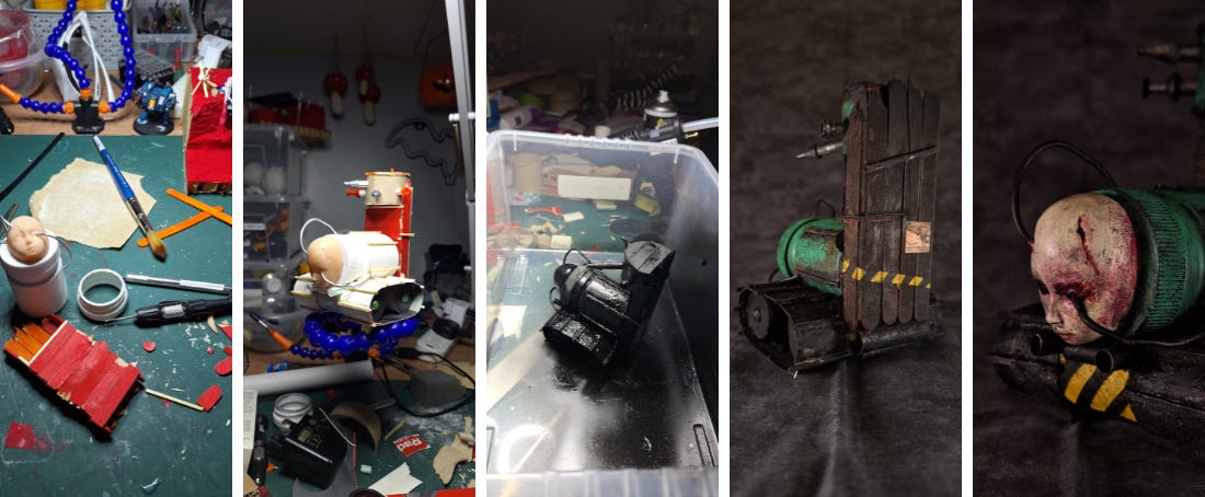 Landscape image, in five sections, in colour. Each section from left to right is a different photo. They are photos of a sculpture in progress. The first photo: a desk, with scraps of paper, wood, card, plastic. Second: An object which looks like both a tank and a train. It has a face, with wires coming out of the eyes. There are tank tracks made of card and wooden sticks. And a turret. Third: The object is in a plastic tub and covered in fresh black paint. Fouth: It is finished, and photographed from the back. It is grim and dark. Green. Rotting wood. Hazard stripes. Fifth: The face is red and sore. The wires are hurting it, and have left open wounds.