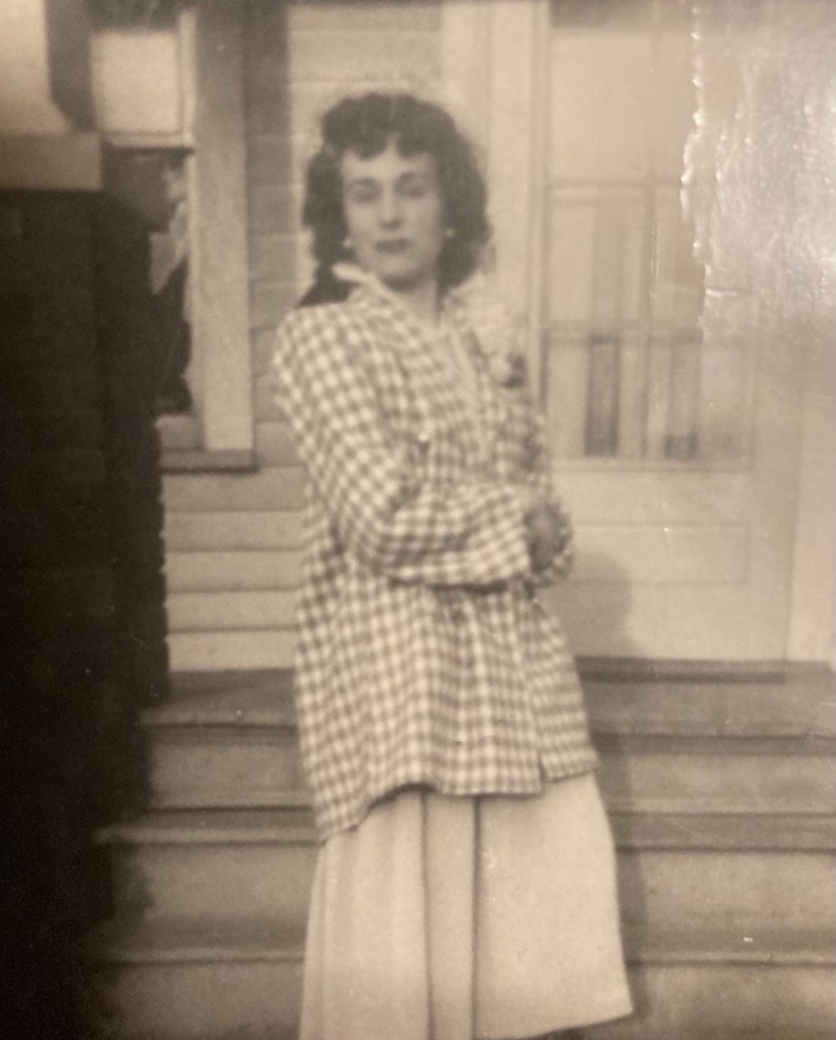A grainy photo of mother from 1950