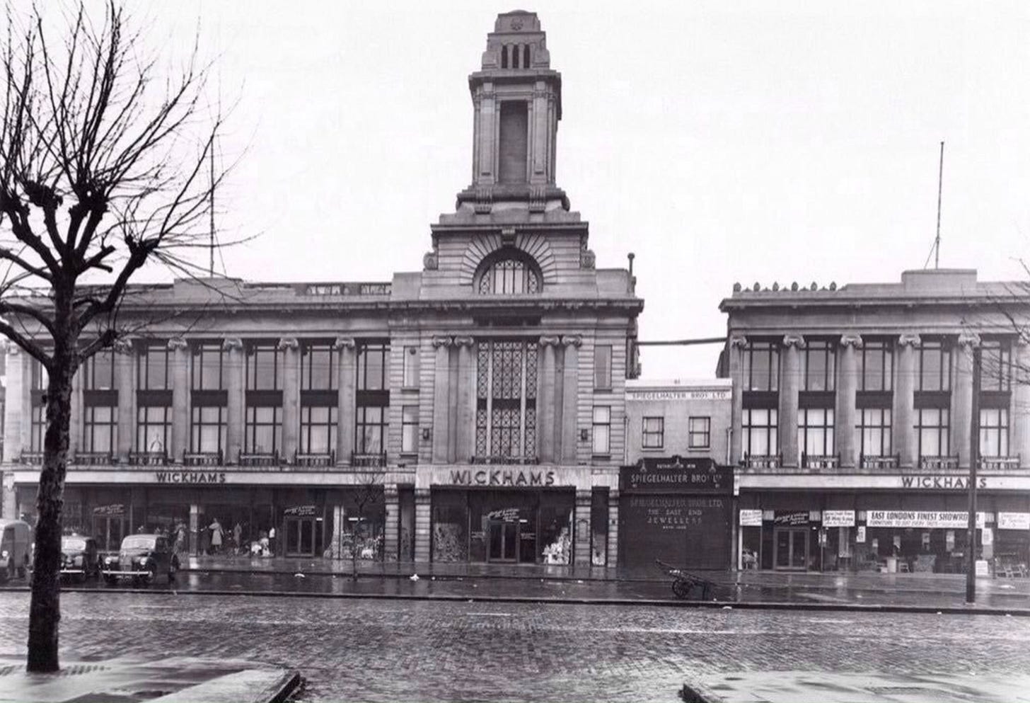 A grand colonnaded department store… interrupted two thirds of the way along by a small jeweller’s shop.