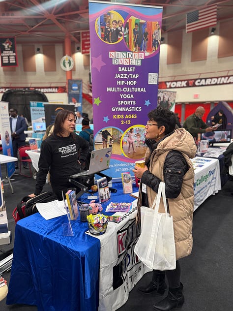 Professional people at a small business expo and the letters NYCPS surrounded by balloons