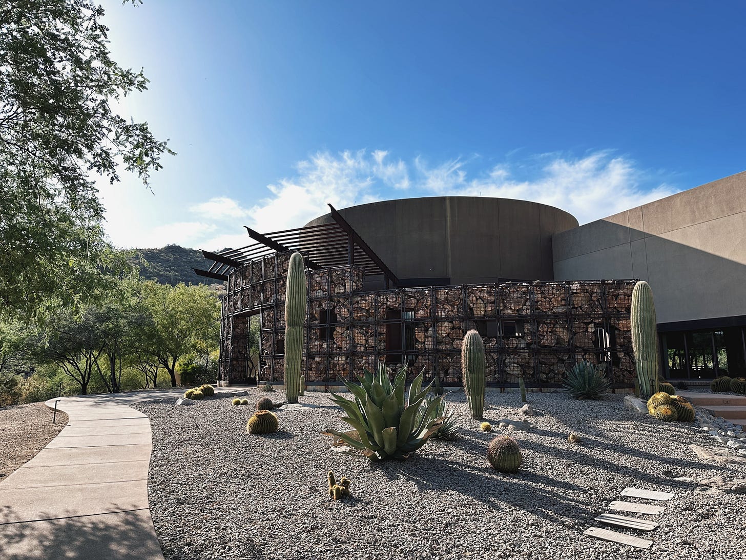 Desert landscaping with cacti and agave surrounding the stone-and-metal exterior of The Ritz-Carlton, Dove Mountain. Desert landscaping with cacti and agave surrounding the stone-and-metal exterior of The Ritz-Carlton, Dove Mountain.