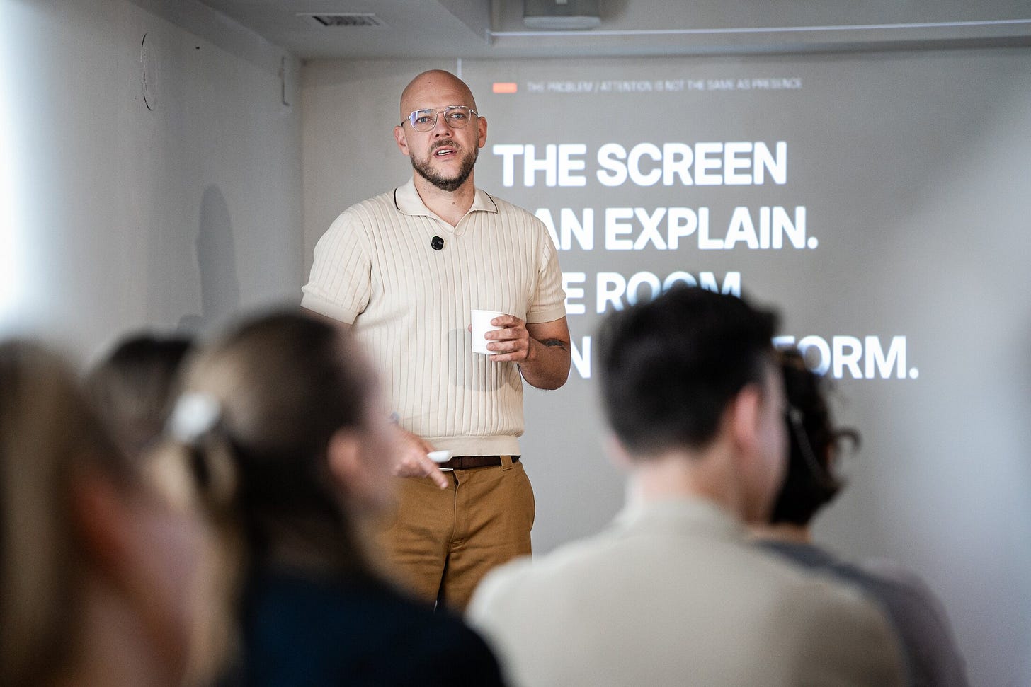 The opening claim: the screen can explain, but the room can transform.