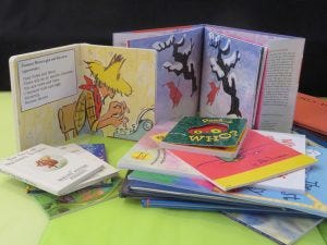 Design a children's picture book such as those shown here. Design a children's picture book such as those shown here.