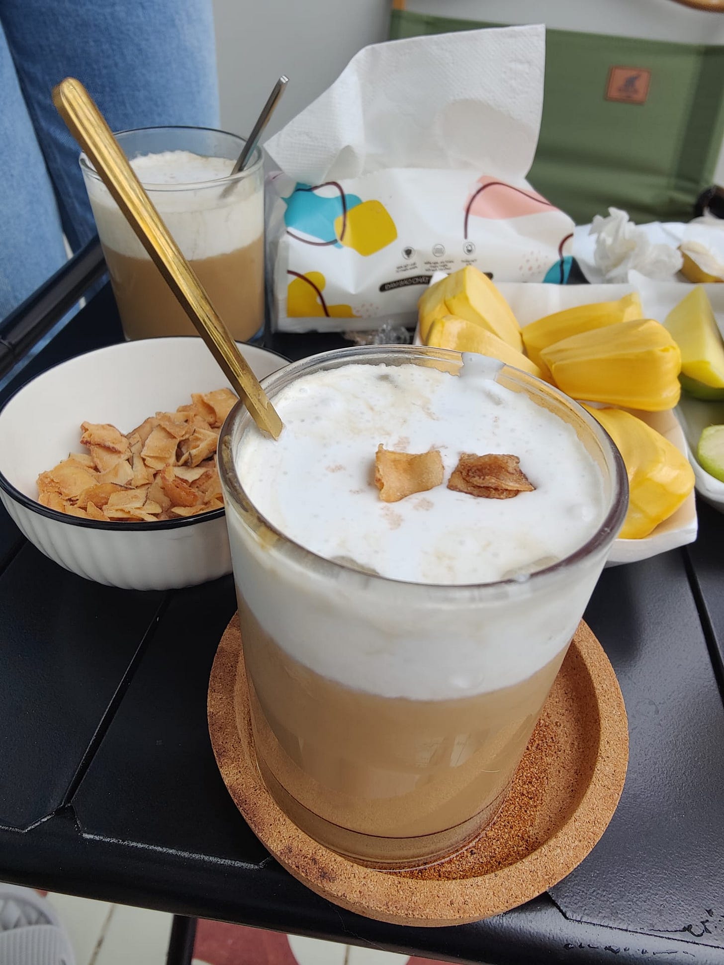 coconut coffee with whipped topping and crispy chips