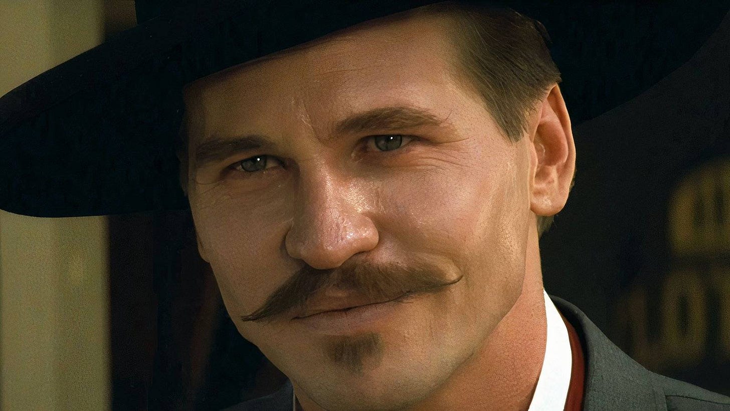 Doc Holliday's Opening Line in Tombstone Secretly Tells Fans Everything  They Need to Know About the Character