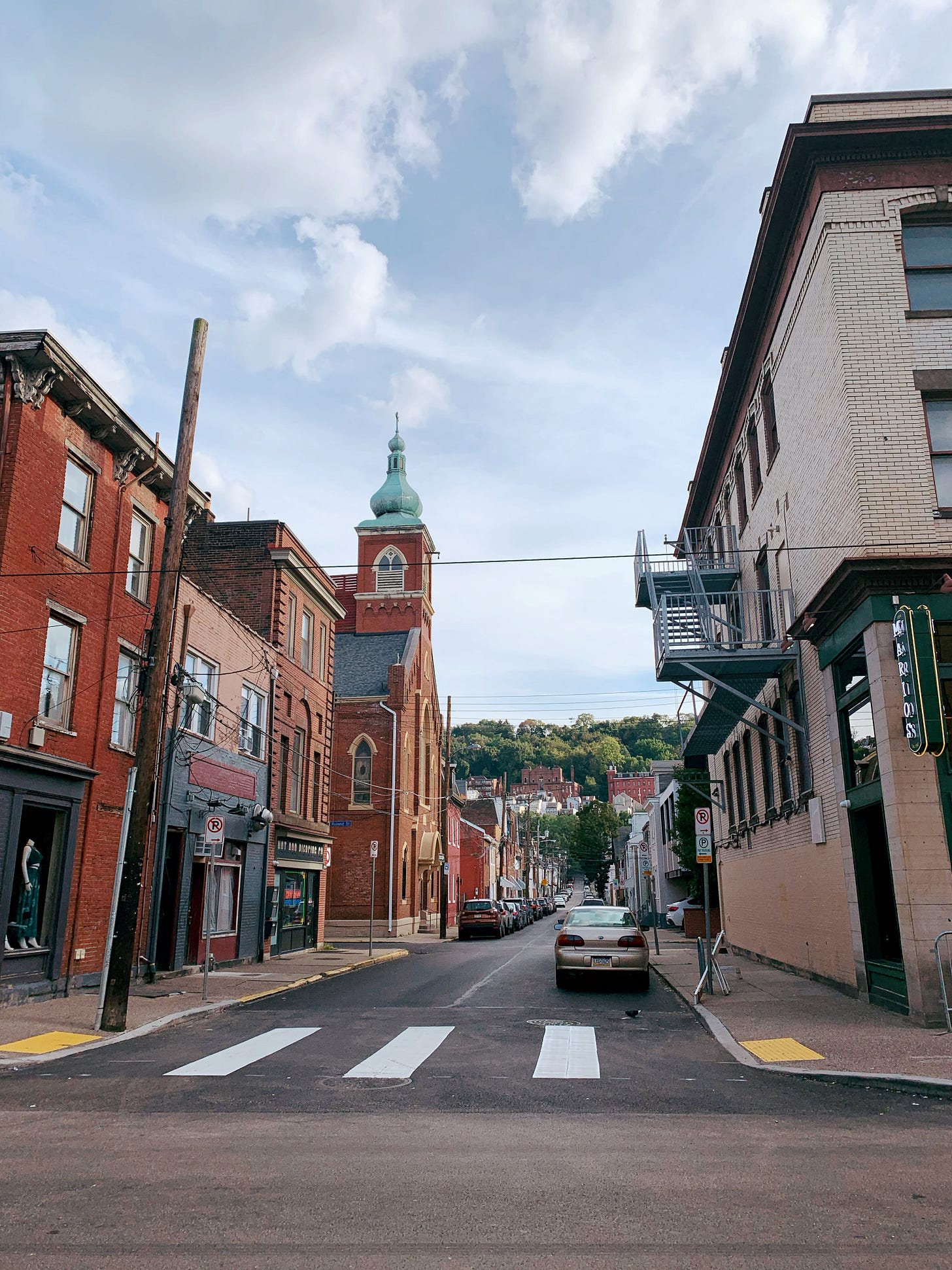 Densely packed street with small brick houses