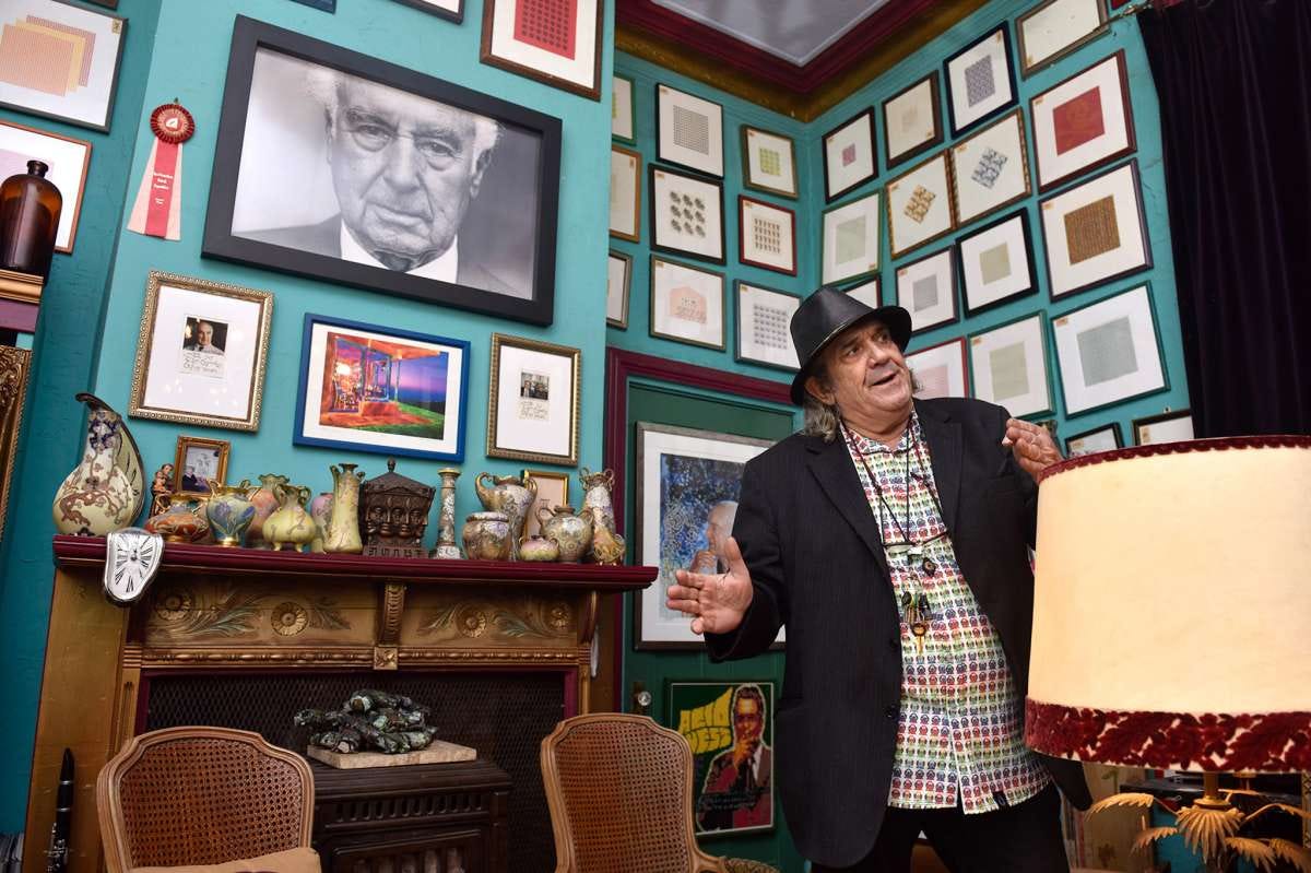 Mark McCloud, curator of the Institute of Illegal Images, gives a tour of his many LSD-related artifacts, on Thursday, Nov. 11, 2021.