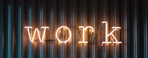 Work and Play yellow neon sign Work and Play yellow neon sign