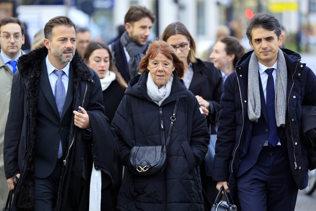 Pelicot with her lawyers Stéphane Babonneau, right, and Antoine Camus