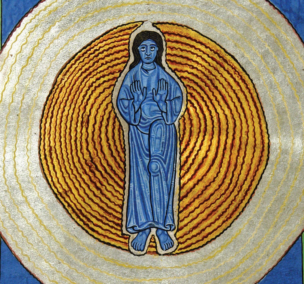 Another medieval manuscript page featuring golden concentric circles around a blue figure of Jesus, who has long hair and is beardless.
