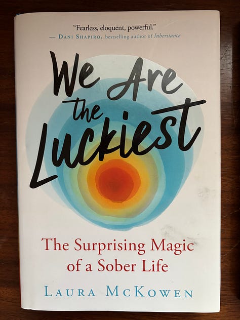 Books pictured are: We Are the Luckiest by Laura McKowen, This Naked Mind by Annie Grace, and Quit Like a Woman by Holly Whitaker