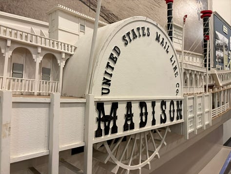 Paddleboat, exhibit, shell buttons