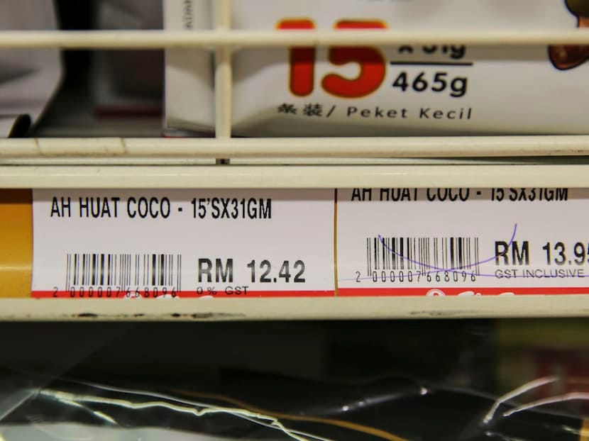 Business as usual, but customers reap rewards as zero-rated GST kicks in  across the Causeway - TODAY