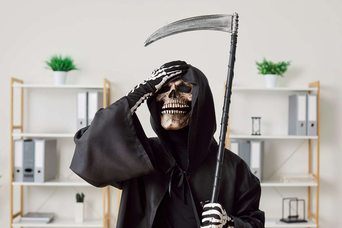 grim reaper hospital fine — Studio Romantic/Shutterstock