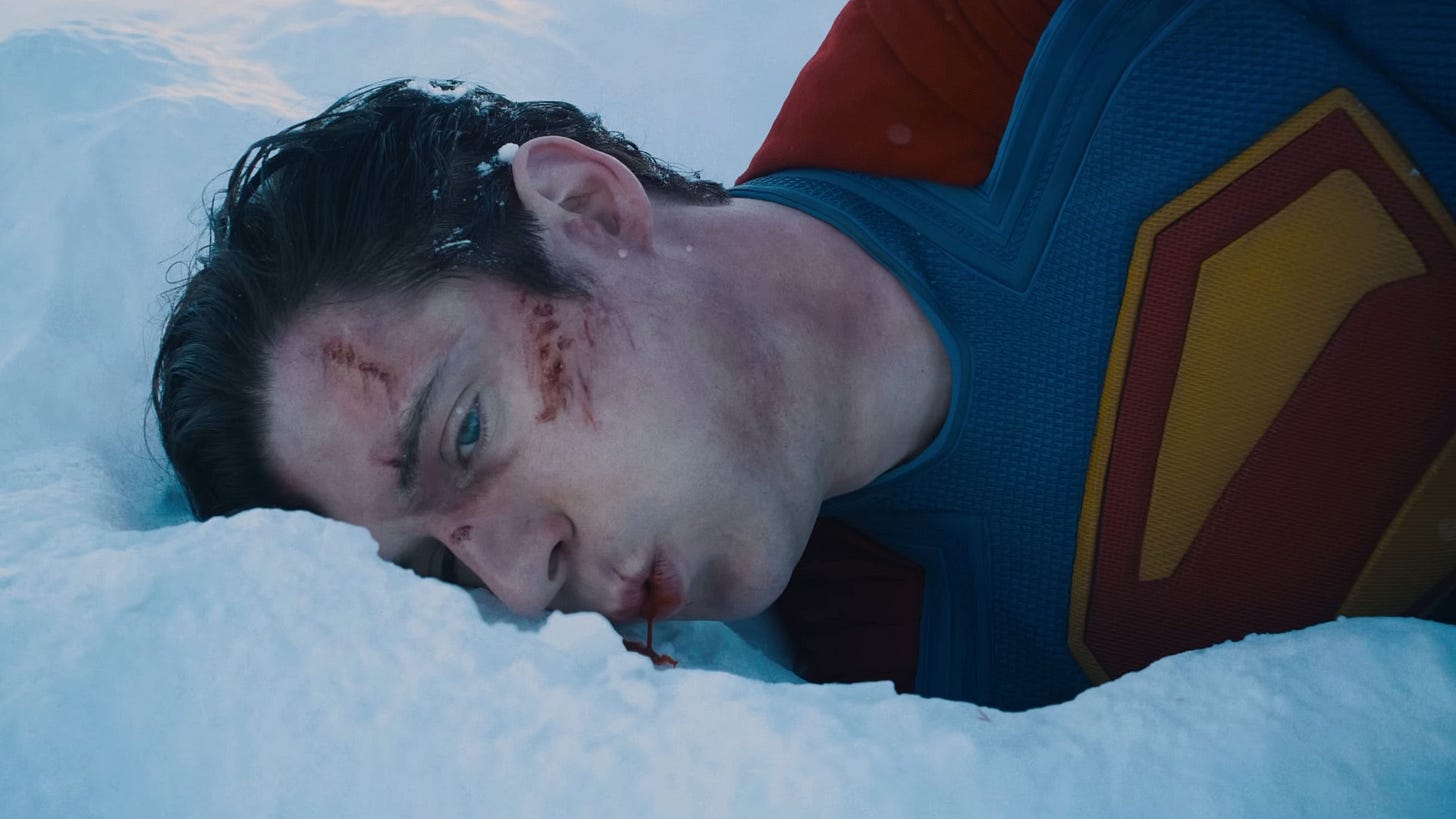A bloodied Superman whistles for Krypto's assistance. Take me home, Krypto.