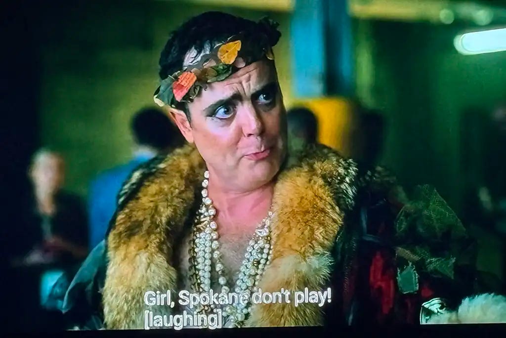 Weird guy laughing, "Girl, Spokane don’t play!"