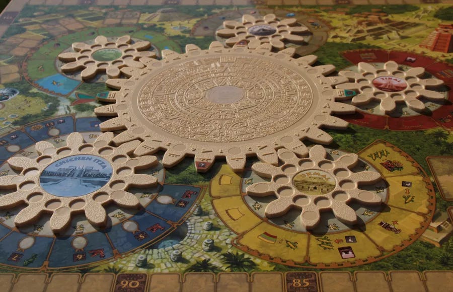 The board of Tzolk'in, with plastic interconnected gears that, when turned, change what parts of the baord they are facing.