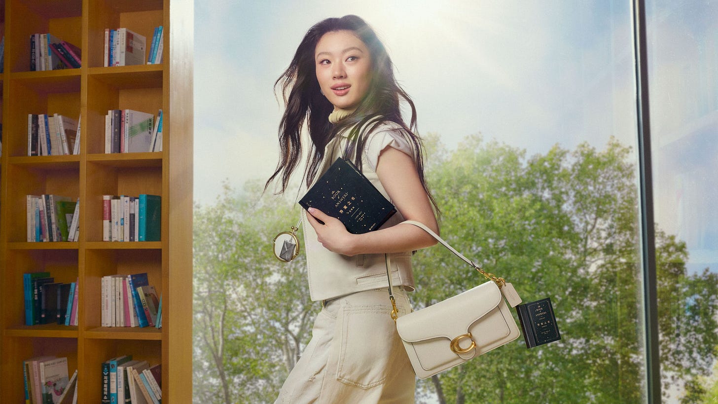 Image may contain Accessories Bag Handbag Purse Face Head Person Photography Portrait Happy Smile and Clothing Image may contain Accessories Bag Handbag Purse Face Head Person Photography Portrait Happy Smile and Clothing