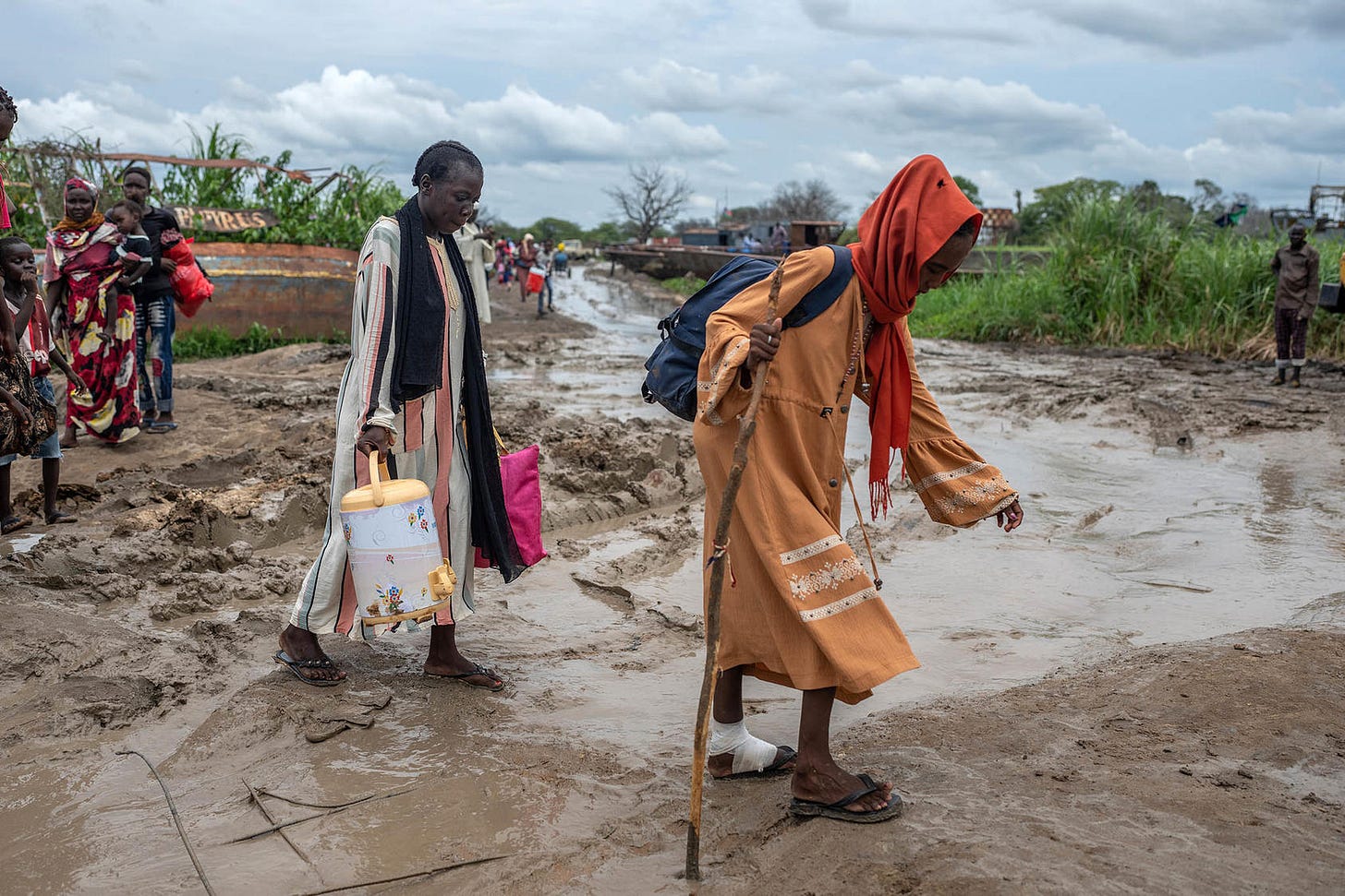 Refugees that fled fighting in Sudan head towards a barge in Renk, South Sudan. August 27, 2023. (Joao Silva/The New York Times)
