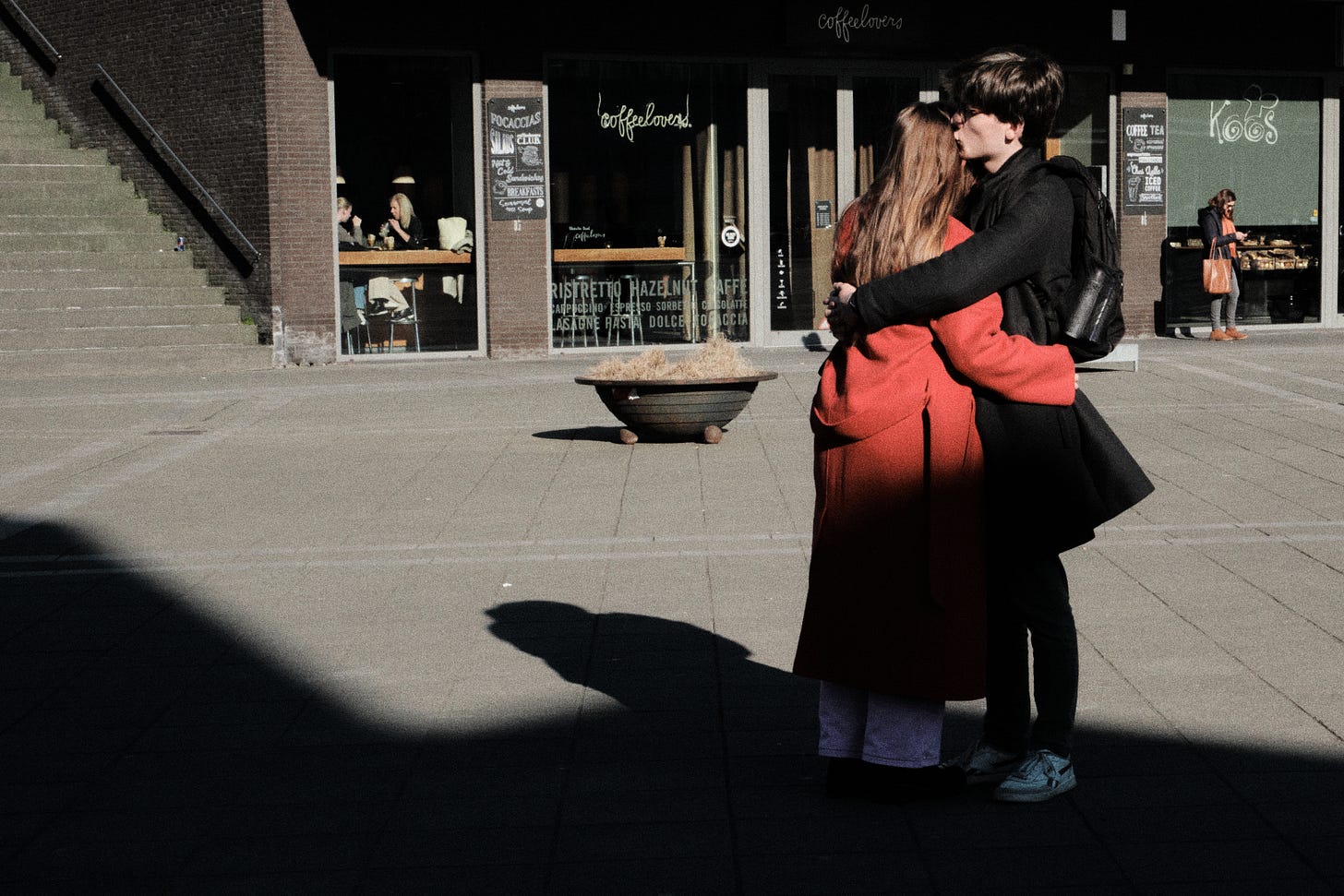 A photograph taken by Dan D'Ascenzo, showing 2 young people arms in arms with lots of love during valentine's day