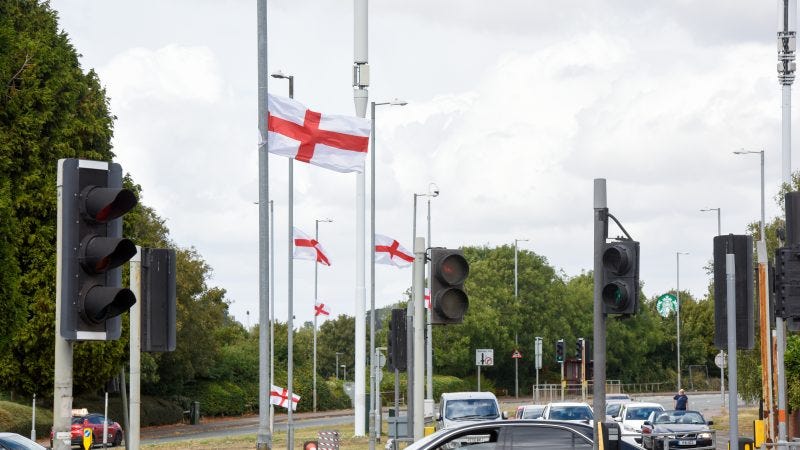 t George flags are flying on a roundabout in Northampton t George flags are flying on a roundabout in Northampton
