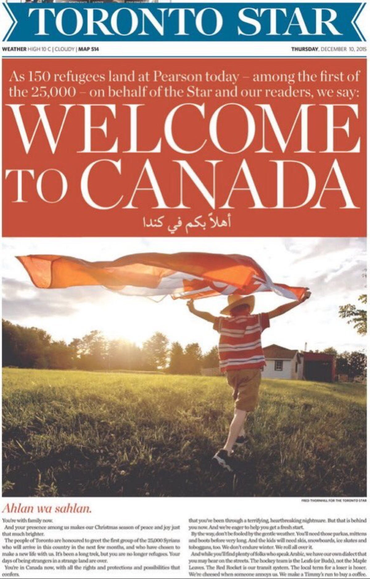 A newspaper cover showing a boy carrying a waving Canadian flag.