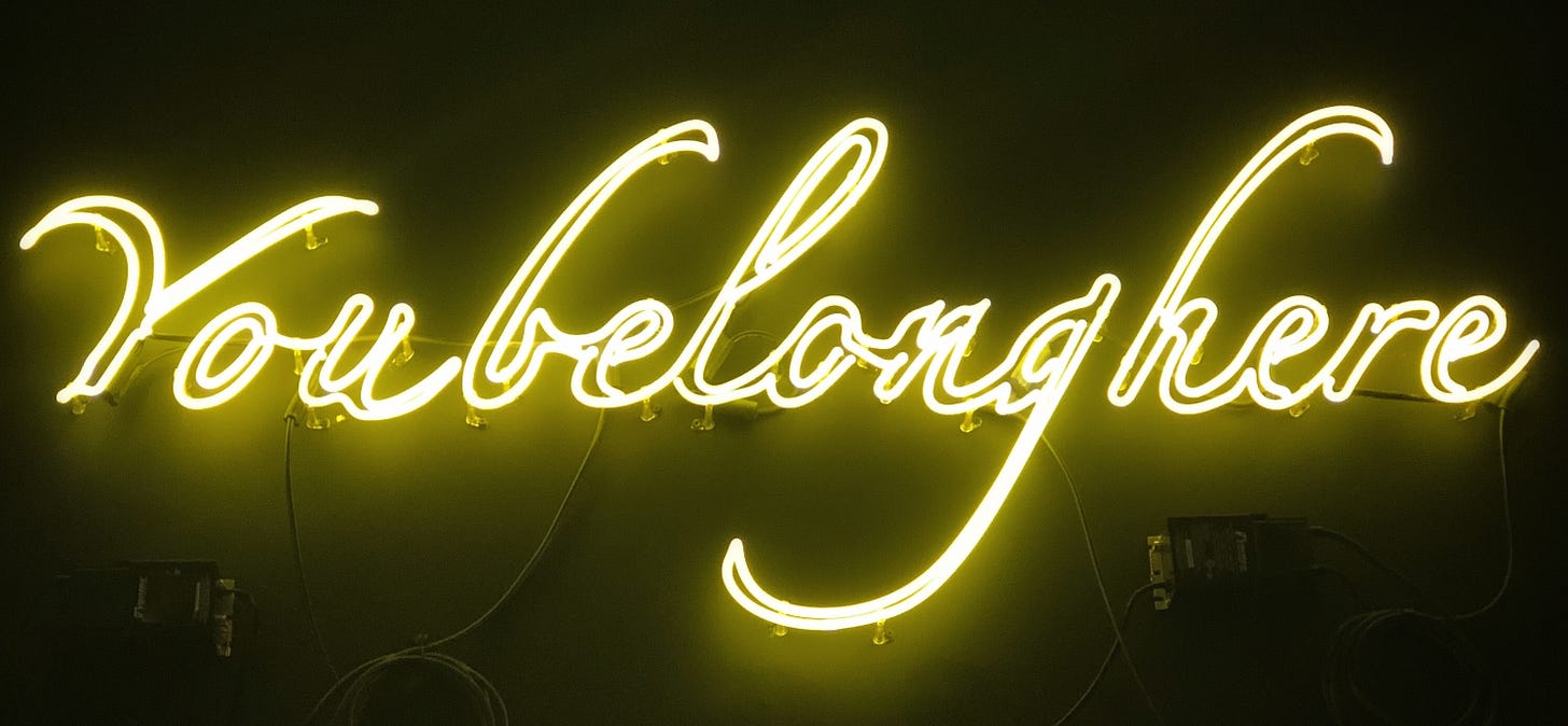 sign that says, "You belong here"