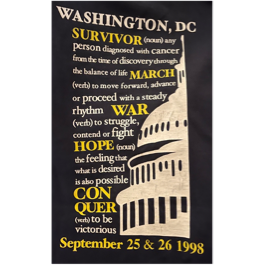 A black shirt with white text and a tower

Description automatically generated