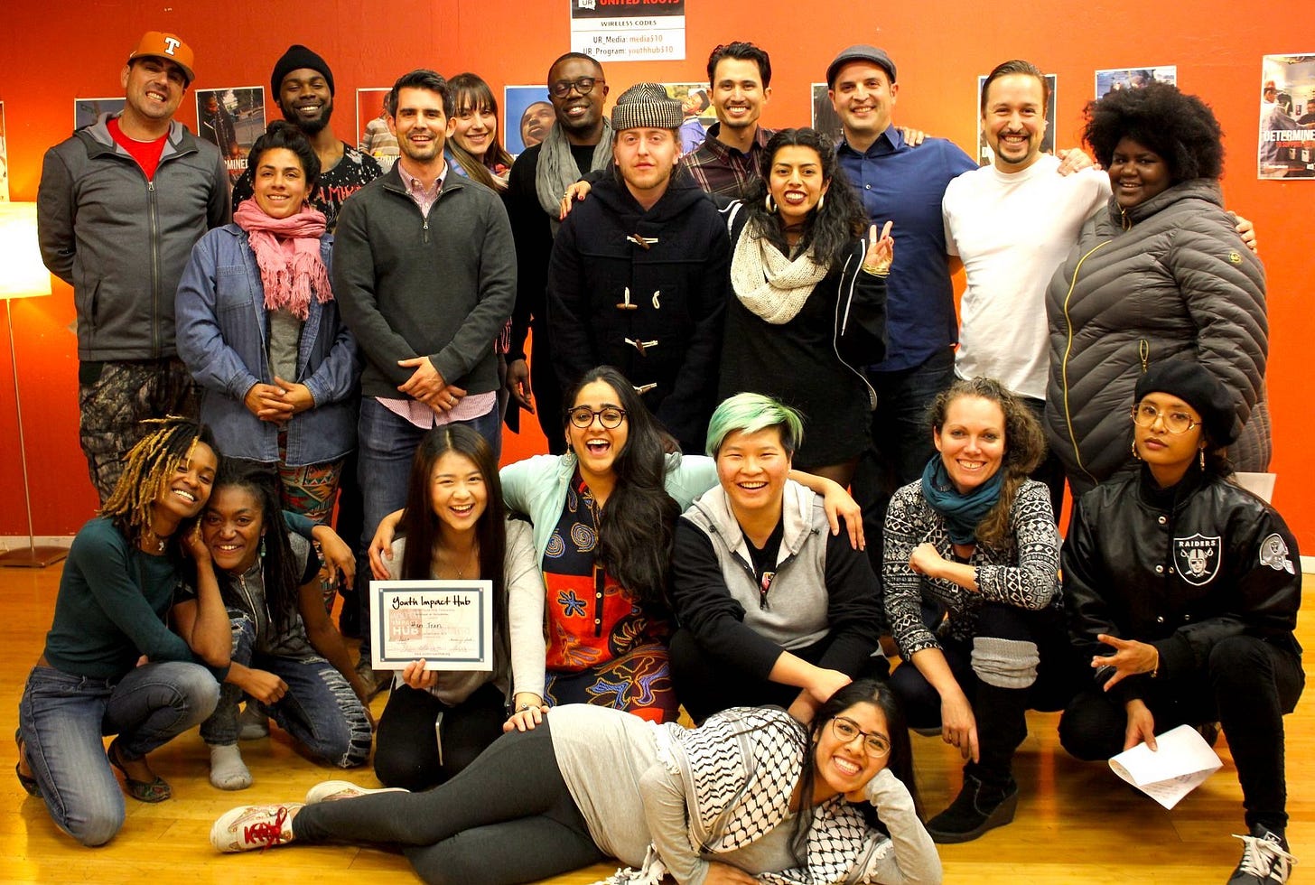 Staff, mentors, and young people at Youth Impact Hub office
