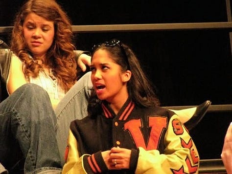 photos of Dr. Kiki in highschool acting as Marty in Grease.