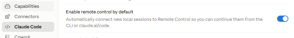 Claude Code settings panel with the "Enable remote control by default" toggle switched on. Claude Code settings panel with the "Enable remote control by default" toggle switched on.