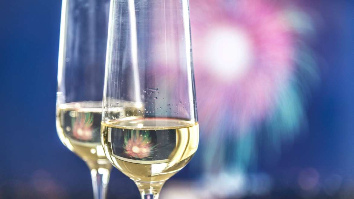 Two glasses of, presumably, champagne. Two glasses of, presumably, champagne.