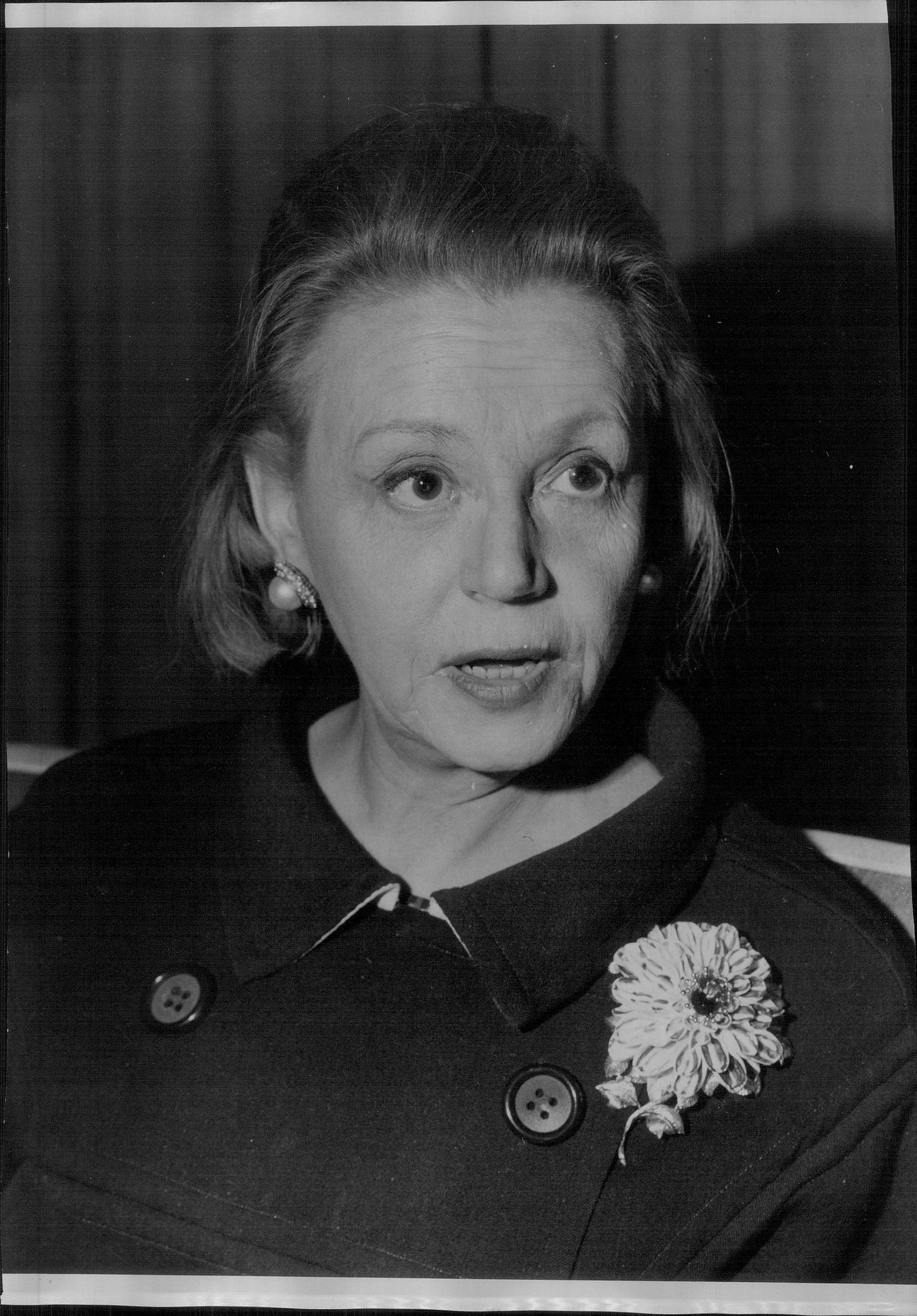 Image may contain Face Head Person Photography Portrait Flower Plant Adult Wedding and Flower Arrangement
