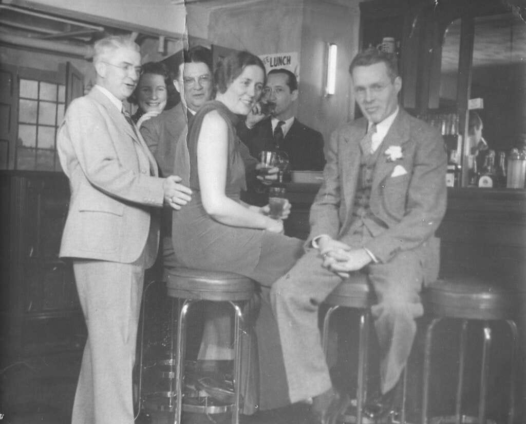 A photograph captured just two years before Prohibition's repeal, highlighting the high stakes faced by those caught with alcohol, soon to be legal. A photograph captured just two years before Prohibition's repeal, highlighting the high stakes faced by those caught with alcohol, soon to be legal.