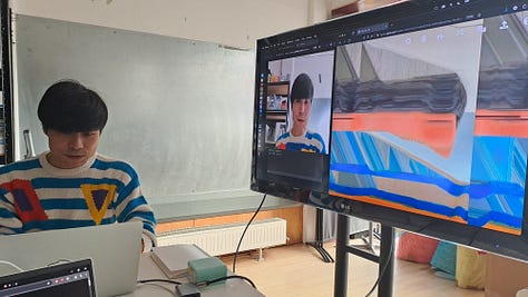 Images of an informal classroom setting where artsist look at creating zines nd computer graphics on screen 