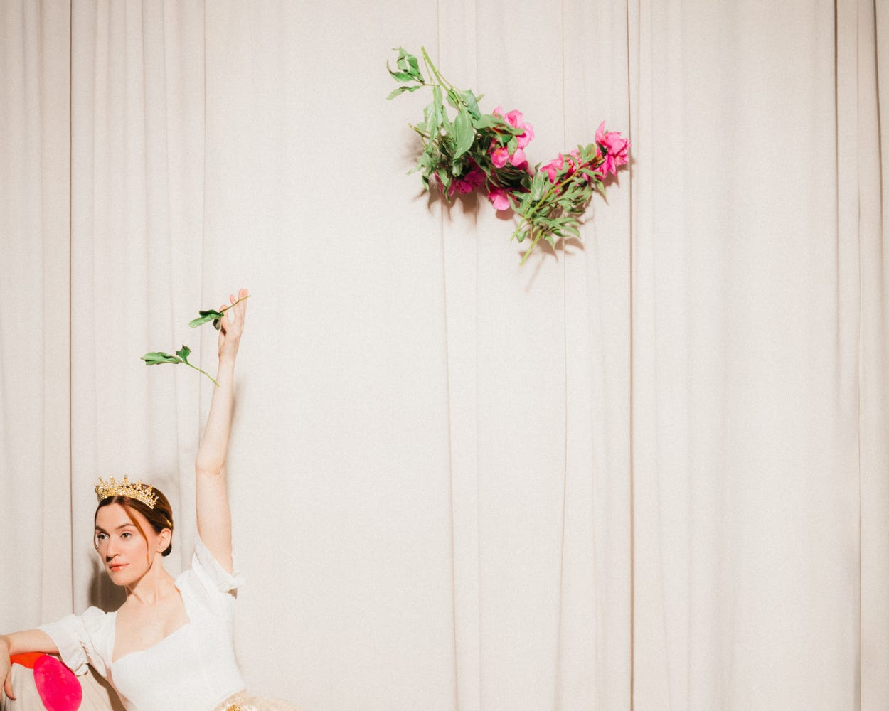 A photo of Cate Scott Campbell tossing flowers, by Mandee Johnson. A photo of Cate Scott Campbell tossing flowers, by Mandee Johnson.