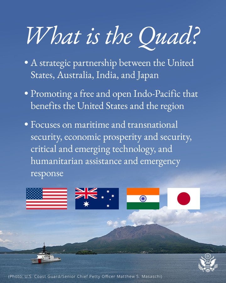 Photo of an Island of the Coast of Japan with a US Coast Guard Vessel. There are flags of the US, Australia, India, and Japan. The title says “What is the Quad?” and graphic text explaining what the Quad Partnership is.