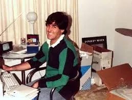 Mark Cuban working in his Dallas apartment during the early days of MicroSolutions.
