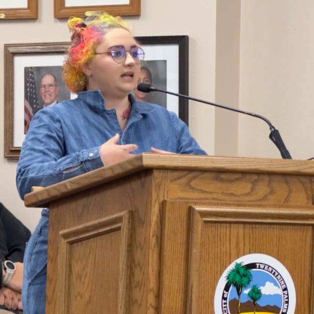 Brianna Whitaker, Britain Vanderbush, Marie and Veno Nathraj speaking in support of the Farmers Market during public comment.